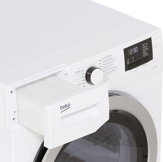 Beko DS7433RX warmtepompdroger met OptiSense sensortechnologie, AquaWave trommel en 7 kg laadvermogen in witte uitvoering.
