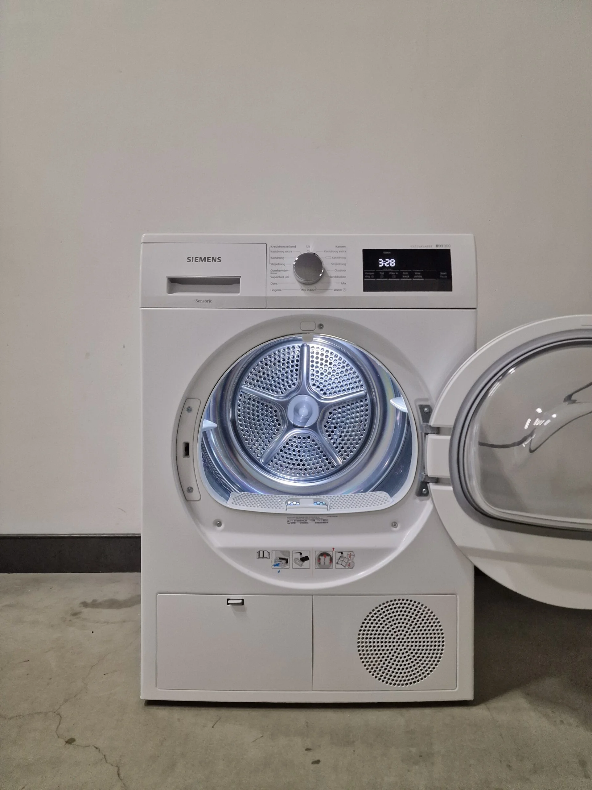 Siemens iQ300 WT45H281NL warmtepompdroger met autoDry, easyClean-filter, softDry trommelsysteem, wolkorf en 7 kg laadvermogen in witte uitvoering.