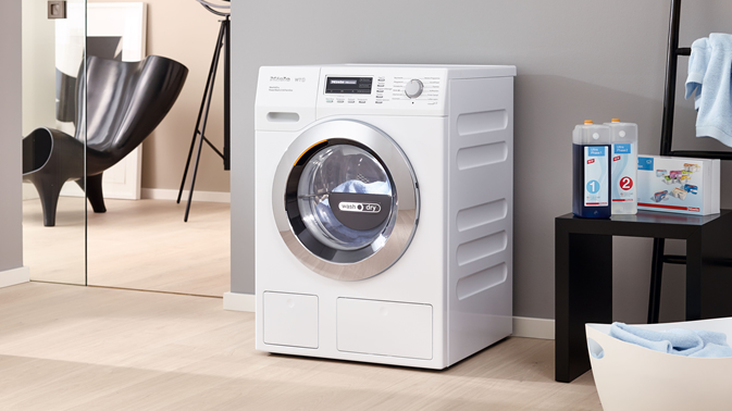 De Miele WT1 WTZH130 WPM was-droogcombinatie met 8 kg wassen, 5 kg drogen, TwinDos, PowerWash 2.0, SteamCare en 1600 toeren. Premium wassen en drogen in één apparaat.